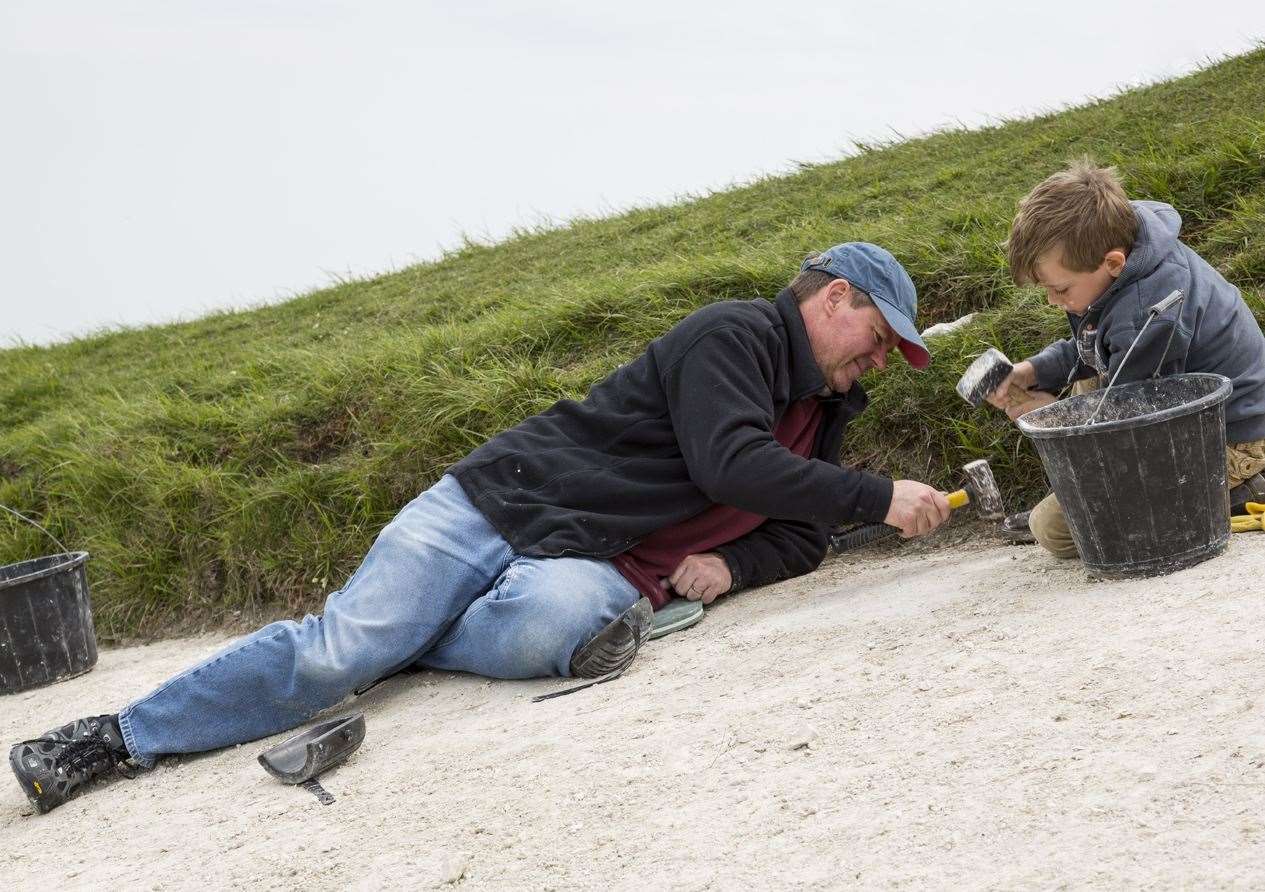 Volunteers scouring the chalk horse at White Horse Hill, Uffington, Oxfordshire. It is the oldest dated chalk figure in the country Pic: James Dobson