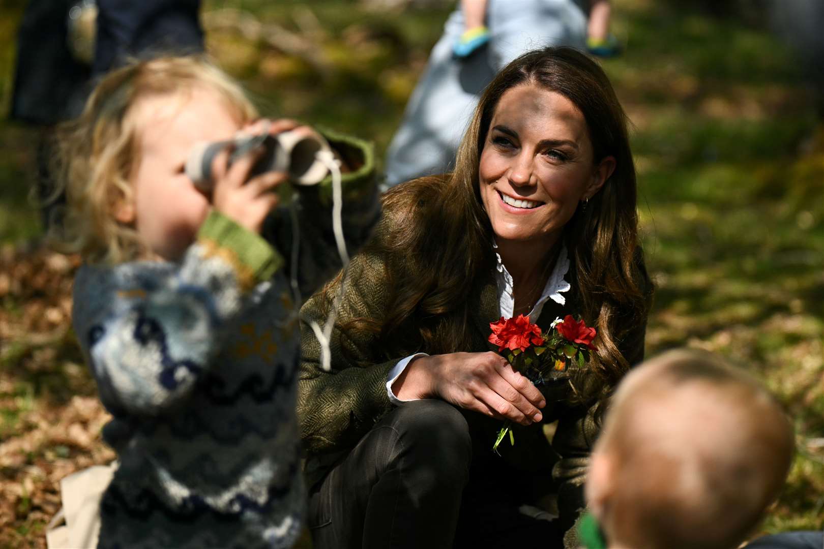 The Princess of Wales played with children who use Ardura Community Forest to learn about nature (Oli Scarff/PA)