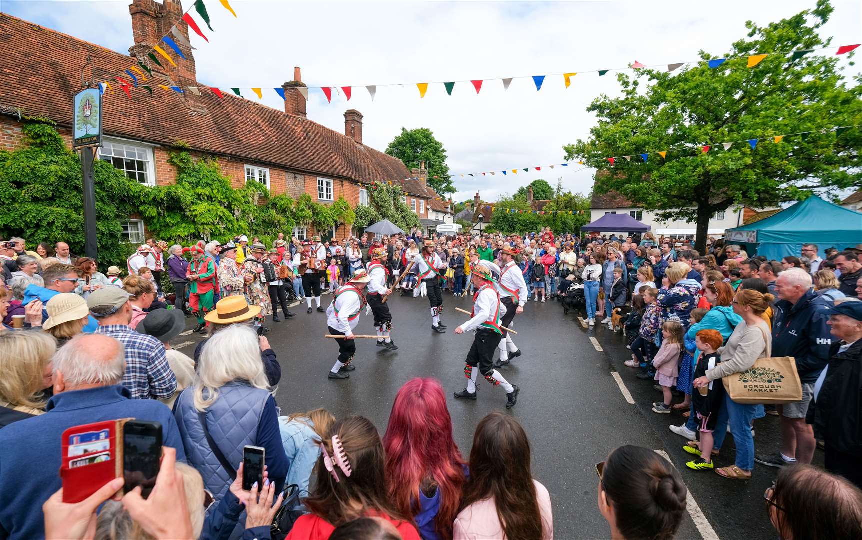 Kennet Morris Men in the village square
