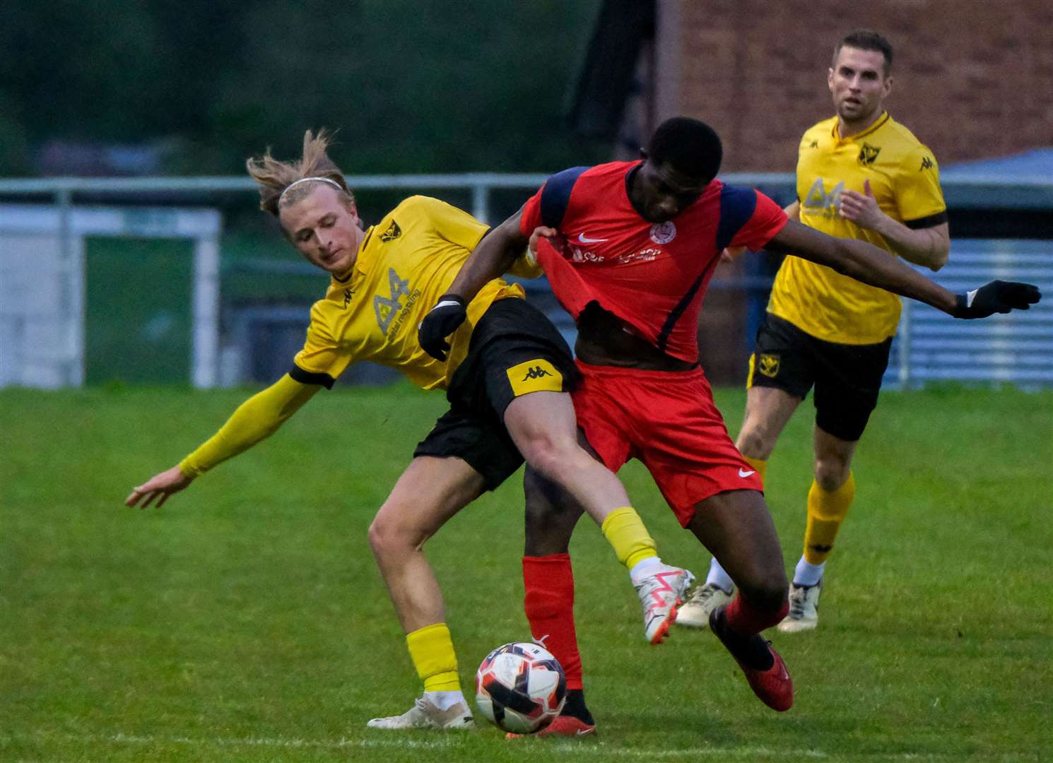 Tadley's Alexander Lawrence battles for possession