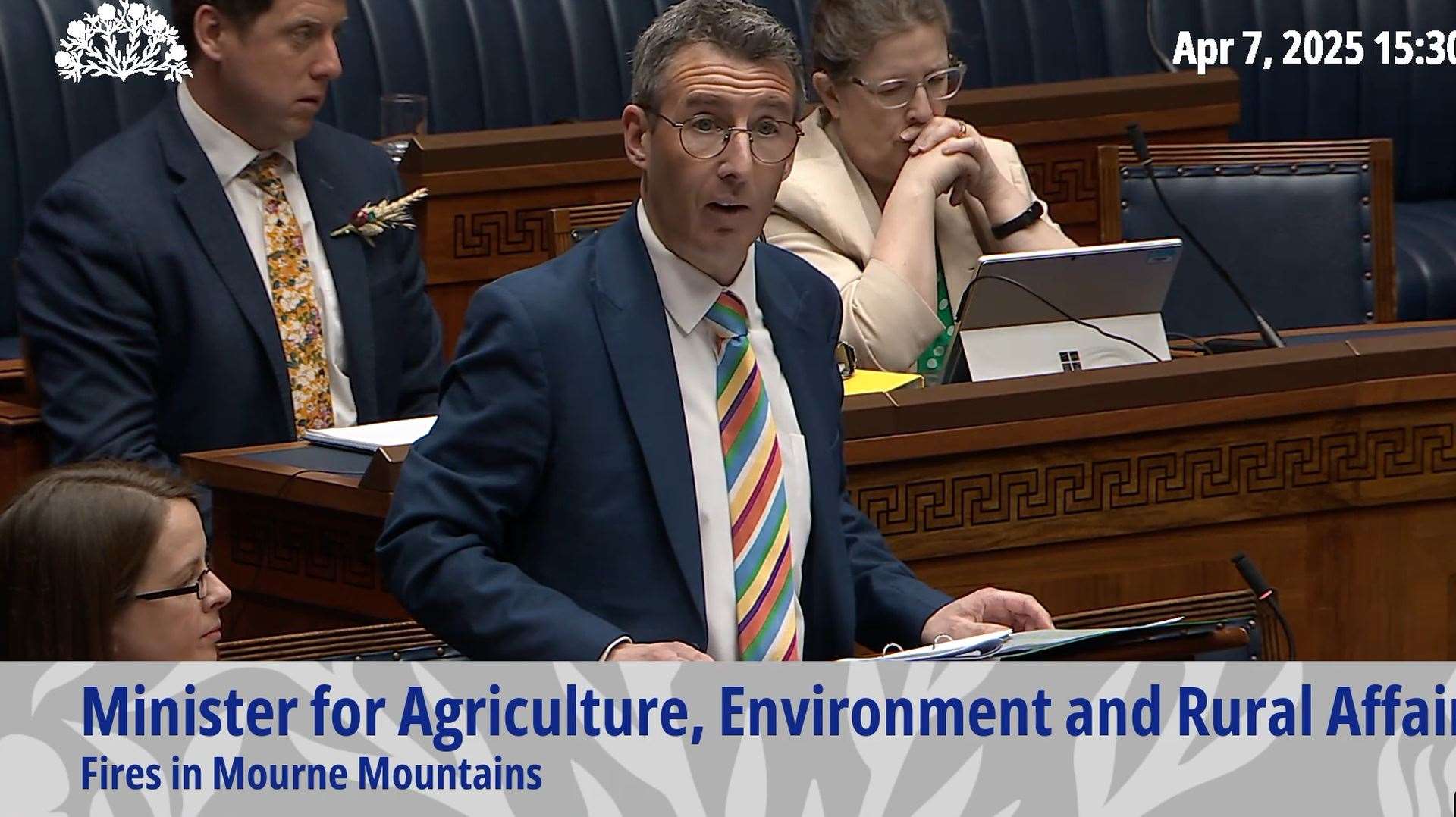 Screen grab from the Northern Ireland (NI) Assembly of Agriculture, Environment and Rural Affairs Minister Andrew Muir answering an urgent Assembly question around the wildfires in Northern Ireland from DUP MLA Diane Forsythe during a sitting of the Northern Ireland Assembly at Parliament Buildings in Belfast on Monday. Issue date: Monday April 7, 2025.