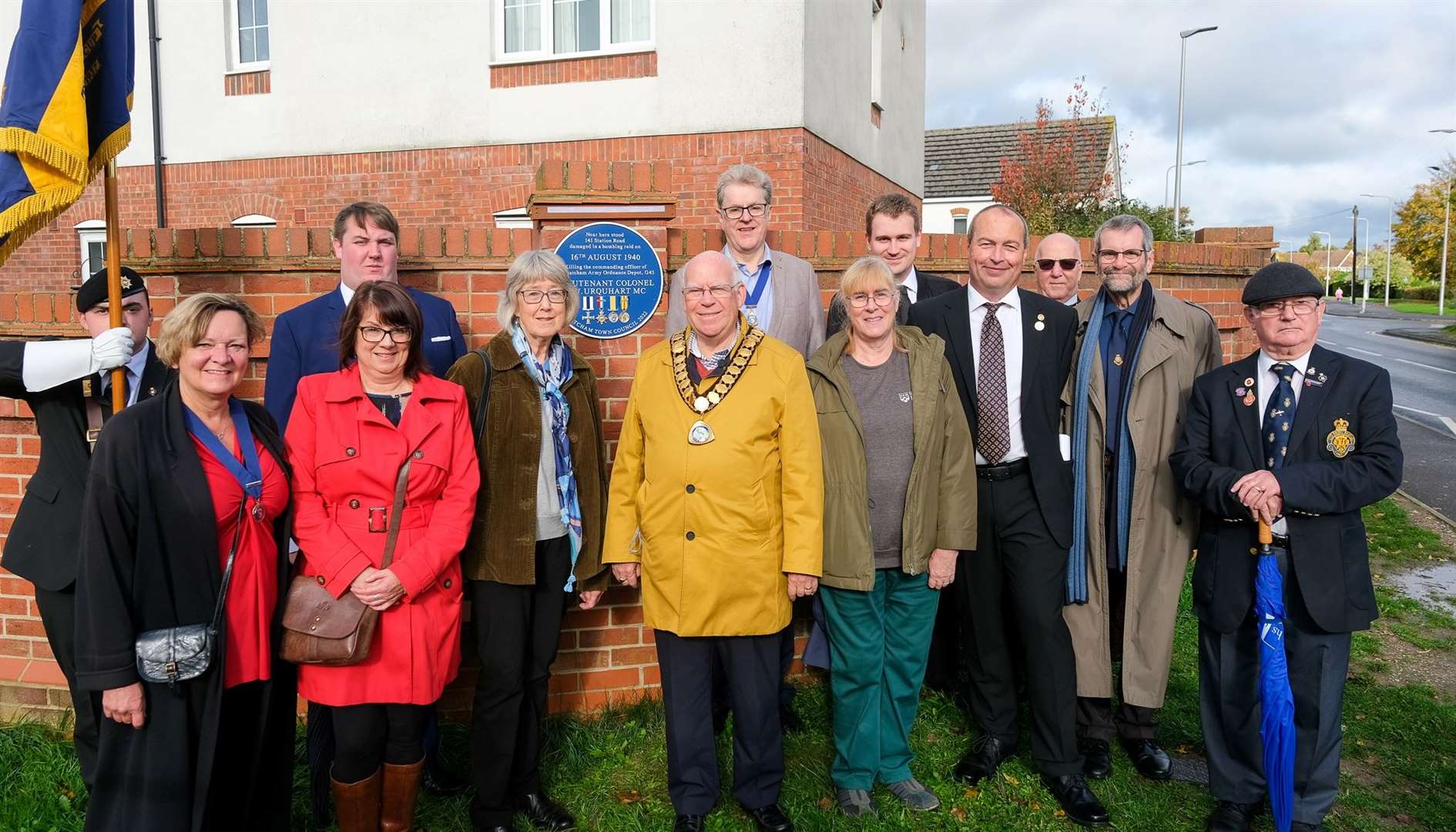 Thatcham Town Council's Heritage Working Party standing the heritage blue plaque dedicated to Lt Col Vernon Watkins Urqhart in October 2022