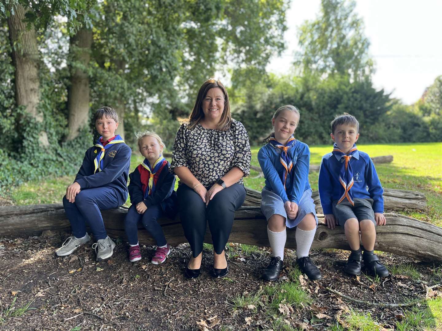 New Executive Headteacher, Mrs Joanna Lagares, poses with her pupils. (59465882)
