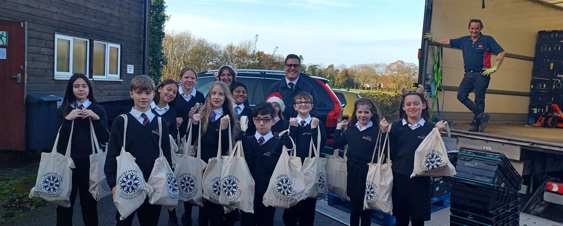 Trinity School help load parcels onto the Swift van ready for delivery. Thanks to Swift and the school for their help