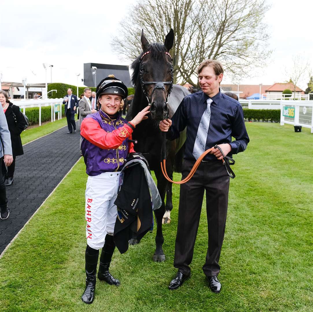 Tom Marquand in the royal silks at Newmarket