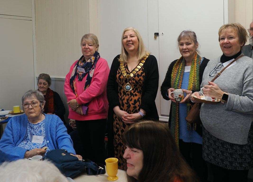 Mayor of Thatcham Suzanne Adamantos posing with members of the group