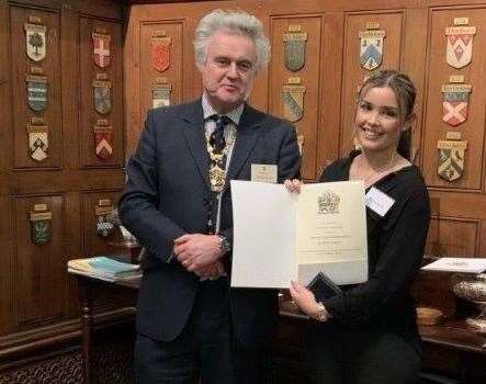Maxima Kennedy receiving her award from Dr Roger Bowdler, Master of the Armourers & Brasiers’ Company