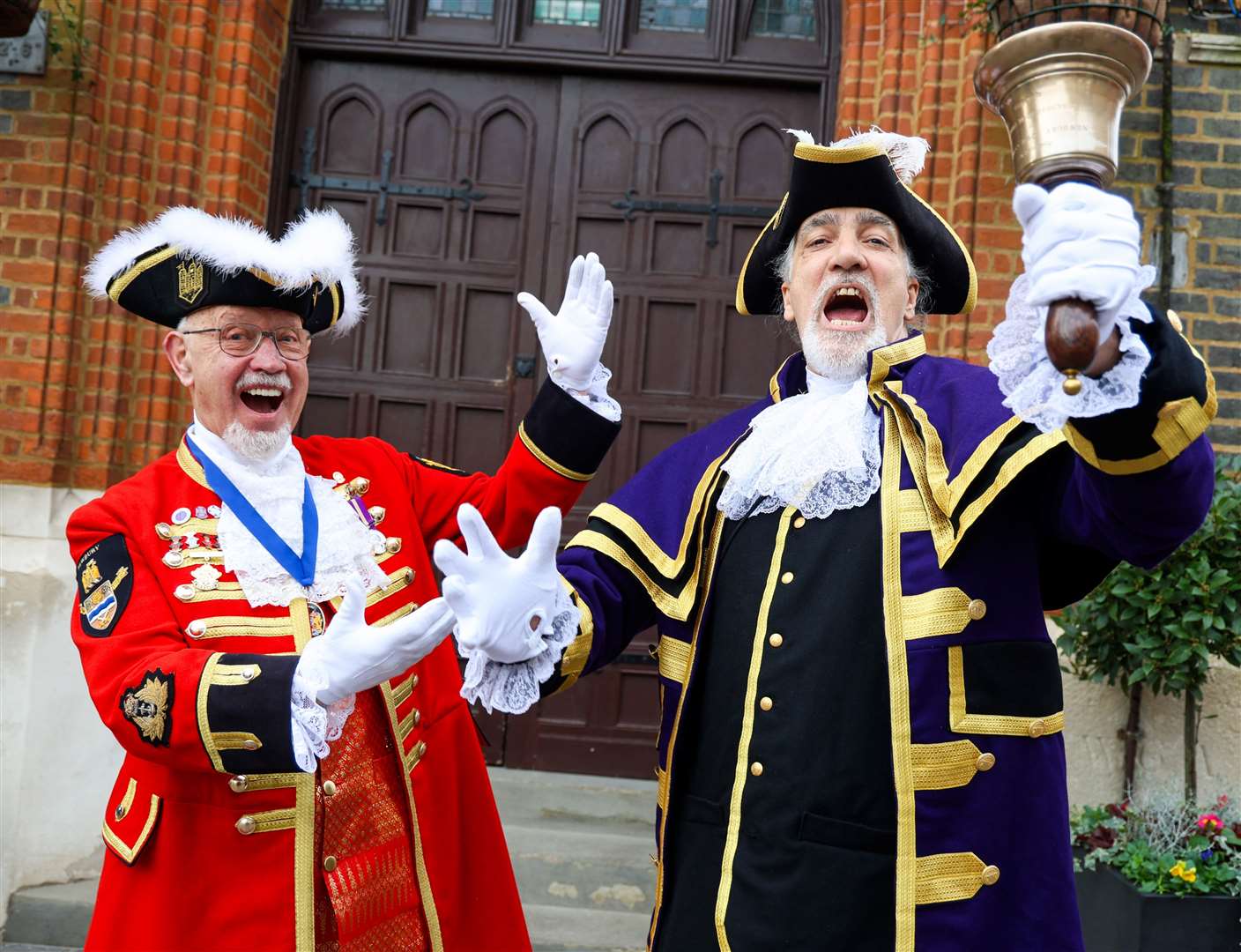 Brian Sylvester handing over the role of Newbury Town Crier to Steve Wallis