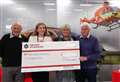 Classic car club gives generous boost to charity