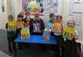 Illustrator of Winnie the Witch swoops by primary school