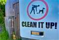 Council contractor backed up with overflowing dog waste bins