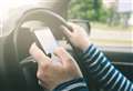 Picking up your phone while driving could cost you £200 from today 