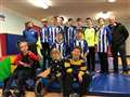 Football squad support charity with logo on kit