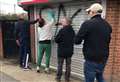 Villagers rally after post office race hate incident