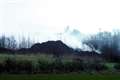 Three-month compost fire continues to smoulder