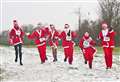 Big freeze doesn't deter Santa fun runners