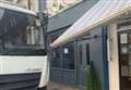 Who can help fix traditional awning at Newbury's Empire Cafe?