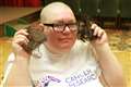 Marjorie shaves her head for charity