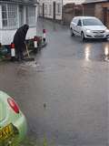 Flood alert issued and rail disruption after downpour