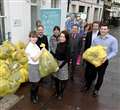 Law firm gets bagging for charity