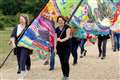 Banner walk celebrates uniqueness of Greenham Common