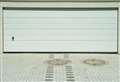 Thieves raid garage and take the door
