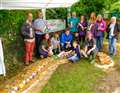 Villagers use 1,200 ecobricks to make a bench