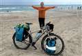 Cancer survivor celebrates after completing stateside charity bike ride