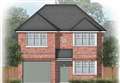 Plans for four homes on site criticised by town council