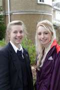 Girls on the crest of a bobsleigh run