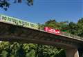 Extinction Rebellion places banners over motorway
