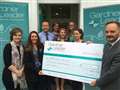 Solicitors raise £9,000 for Naomi House