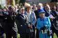 Queen watches as her horse wins at Newbury races 