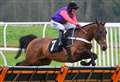 The Queen's Kincardine wins at Newbury Racecourse 