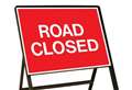 Road closed as workers lay cable