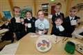 Pottery cash for school mosaic fund