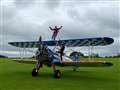 Thrill-seeking pensioner raises thousands through charity wing walk 