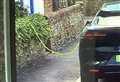 Trip hazard fears over electric vehicle charging cables across the pavement