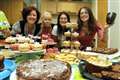Coffee and cake fill the coffers for cancer care