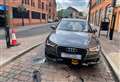 Couple shaken after car struck by rising bollard
