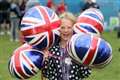 Rain stays away as district floods with red, white and blue