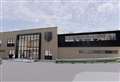 Plans for a new sports hall at The Downs School have been put through the wringer.