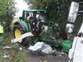 Driver cut from wreckage after lorry and tractor crash at East Garston. 