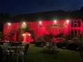 Watermill theatre turns red