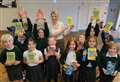 Village school library officially opened by award-winning author