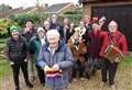 90-year-old veteran knits beanies for all his neighbours at Christmas