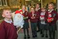 Primary School pupils create Santa models out of clay, papier mâché and Lego