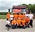 Tadley vicar joins firefighters' charity engine pull