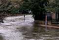 Flooded roads remain closed