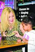 Singer Pixie Lott visits Newbury to sign new single